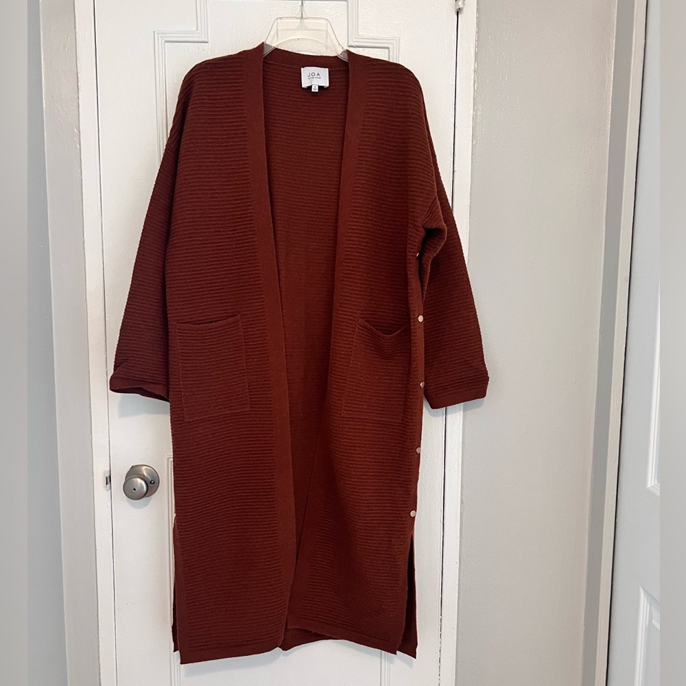 Like new, J.O.A duster sweater with great slit gold hardware!